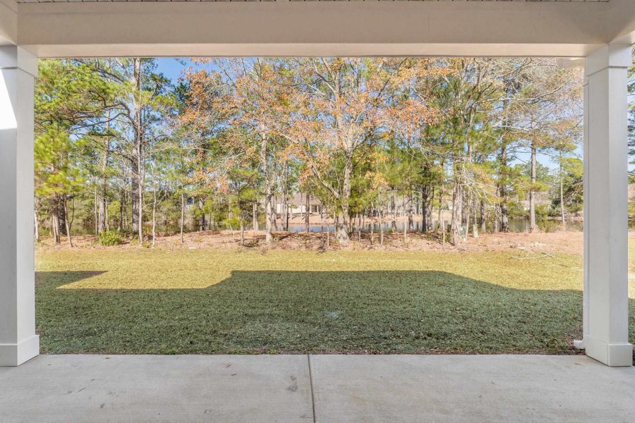 Exterior details and patio area of a home in Long Bay Golf Club, Longs (Image 22).