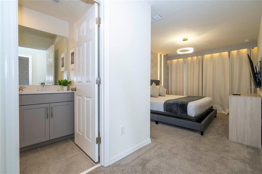 Furnished interior view inside a new home in Solara Resort, Kissimmee (Image 26).