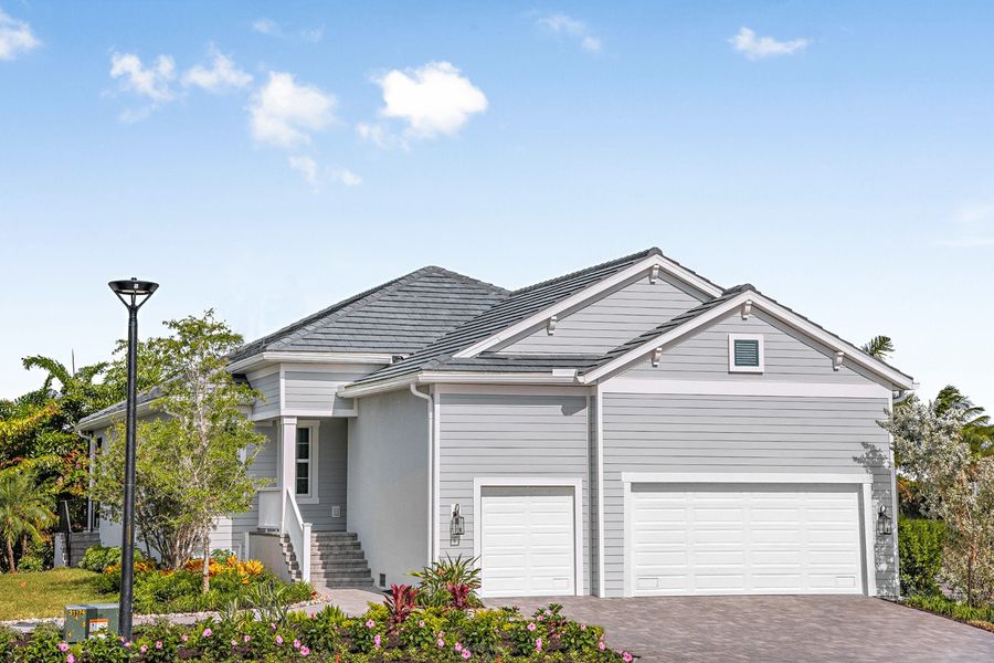 Representative exterior photo of a completed home built from the Meadow Brook by Neal Communities in Tide Marsh, Fort Myers, FL (Image 19).