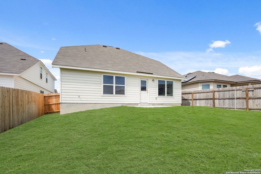 Front exterior of a new home in Cinco Lakes, San Antonio, TX, highlighting curb appeal (Image 18).