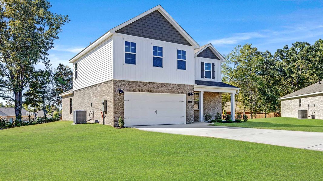 Front exterior of a new home in Bailey Park, Fayetteville, TN, highlighting curb appeal (Image 2). Front exterior of a new home in Bailey Park, Fayetteville, TN, highlighting curb appeal (Image 2).