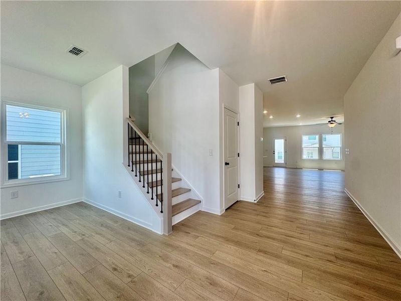 Spacious, unfurnished interior of a new home in Eastlyn Crossing, Flowery Branch (Image 27).