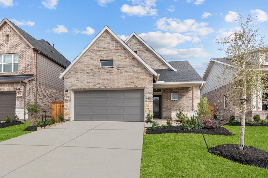 Representative exterior photo of a completed home built from the The Arlene by David Weekley Homes in The Grand Prairie 40’, Hockley, TX (Image 1). Representative exterior photo of a completed home built from the The Arlene by David Weekley Homes in The Grand Prairie 40’, Hockley, TX (Image 1).
