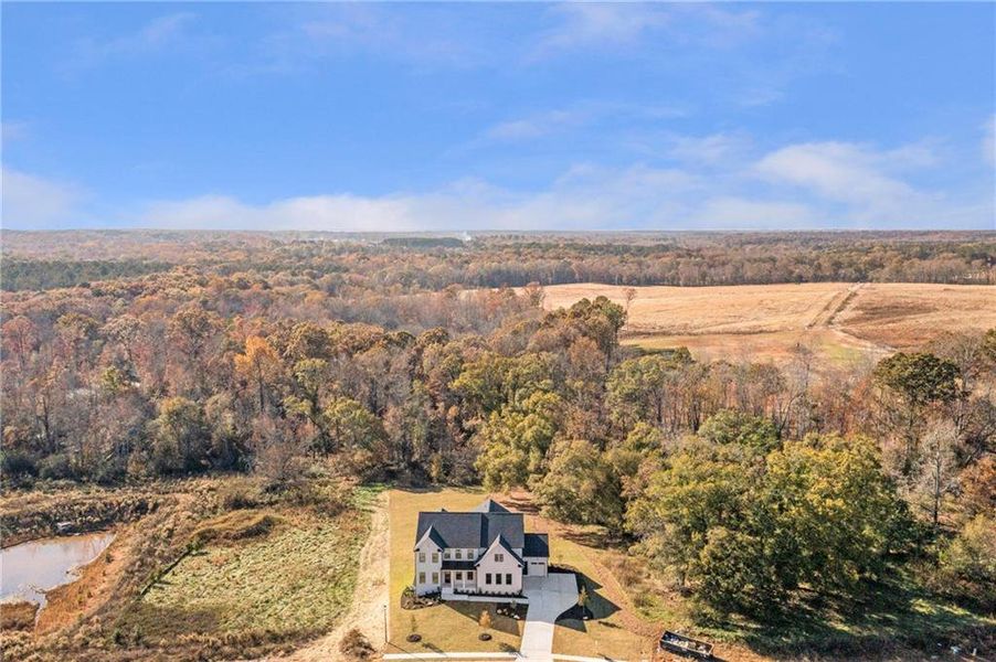 Front exterior of a new home in , Bogart, GA, highlighting curb appeal (Image 1).