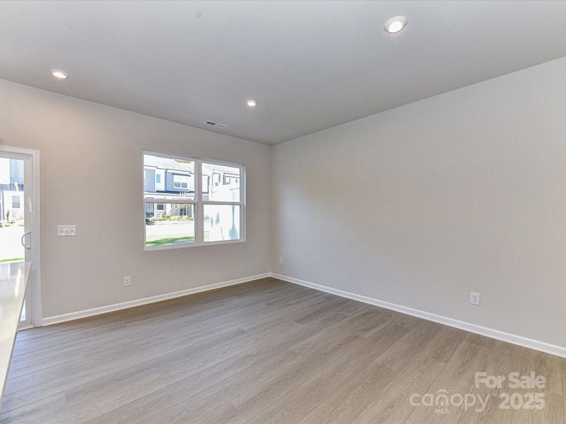 Dining Space Featuring Large Bright Window.