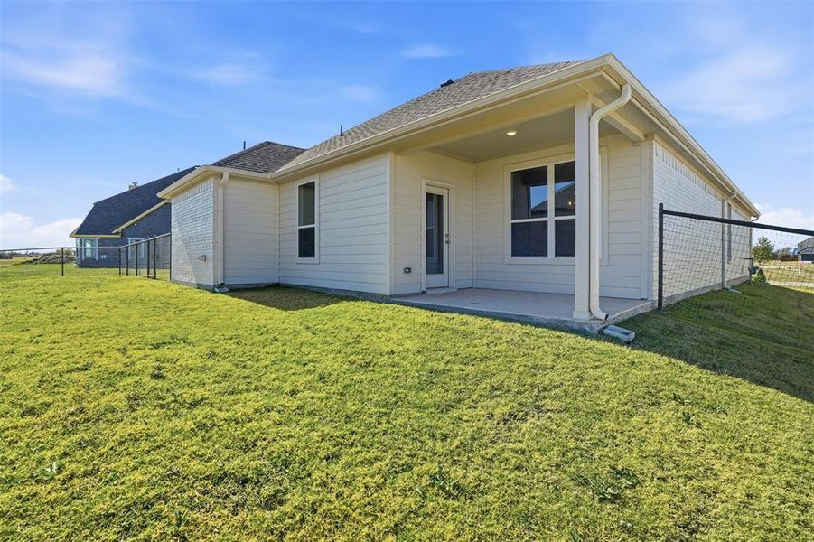 Exterior details and patio area of a home in Wildcat Ridge, Godley (Image 22). Exterior details and patio area of a home in Wildcat Ridge, Godley (Image 22).