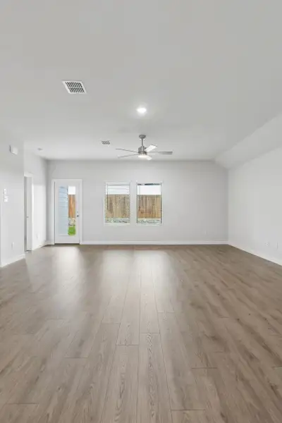 Living Room in the Oscar home plan by Trophy Signature Homes – REPRESENTATIVE PHOTO Living Room in the Oscar home plan by Trophy Signature Homes – REPRESENTATIVE PHOTO