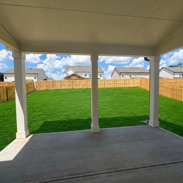 Exterior details and patio area of a home in Rosewood Lake Estates, Hoschton (Image 26).