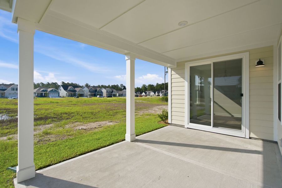 Exterior details and patio area of a home in Terrapin, Leland (Image 3).