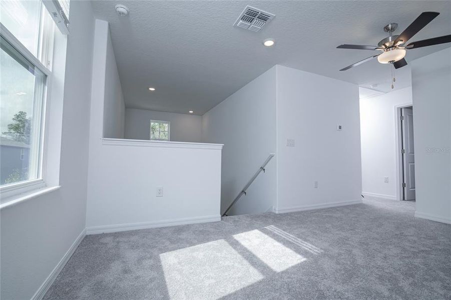 Spacious, unfurnished interior of a new home in Saddle Creek Preserve: The Manors II, Lakeland (Image 52).