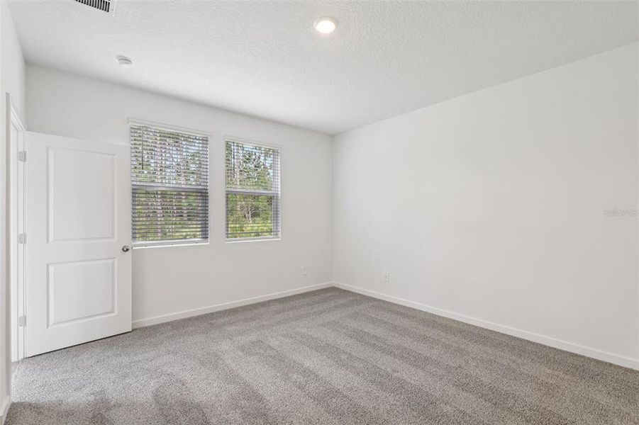 Spacious, unfurnished interior of a new home in Flagler Village - Classic Series, Palm Coast (Image 38). Spacious, unfurnished interior of a new home in Flagler Village - Classic Series, Palm Coast (Image 38).