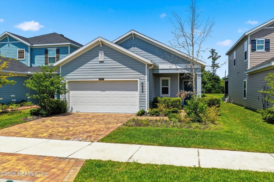 Front exterior of a new home in , Jacksonville, FL, highlighting curb appeal (Image 23).