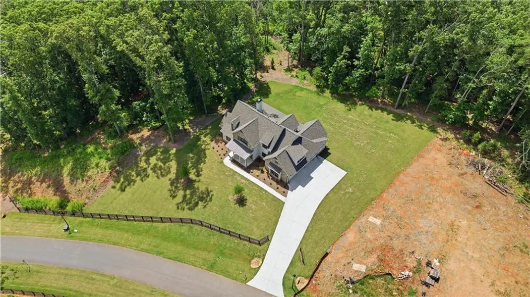 Front exterior of a new home in , Canton, GA, highlighting curb appeal (Image 2). Front exterior of a new home in , Canton, GA, highlighting curb appeal (Image 2).