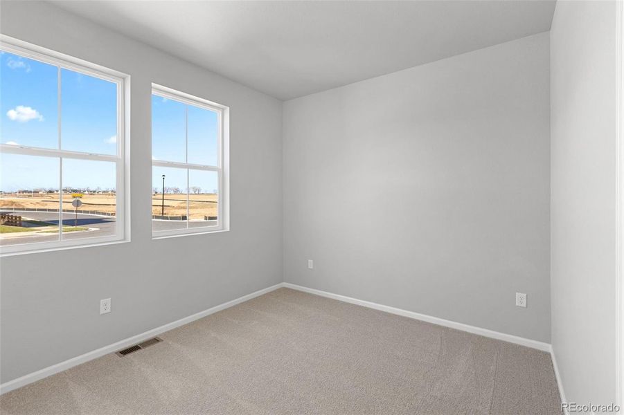 Spacious, unfurnished interior of a new home in Talon Pointe, Thornton (Image 19).