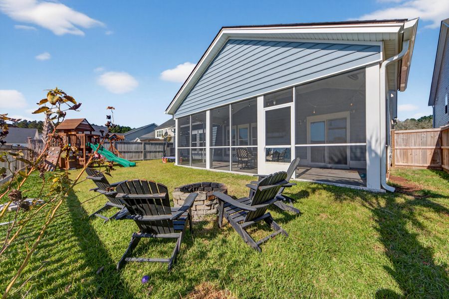 Exterior details and patio area of a home in Azalea Ridge at Summers Corner: Arbor Collection, Summerville (Image 21).