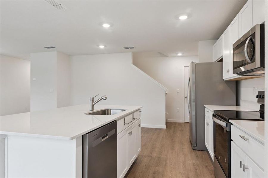 Furnished interior view inside a new home in Vineland Reserve, Osteen (Image 10).