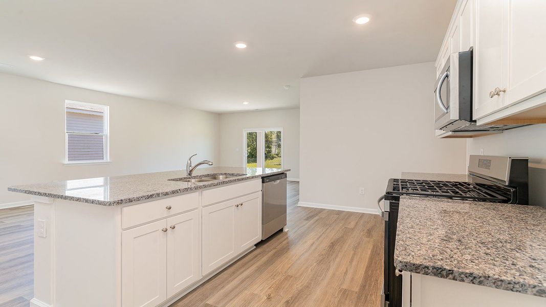 Representative furnished interior of a home built from the ROBIE by D.R. Horton in Sandridge Park, Little River (Image 7).