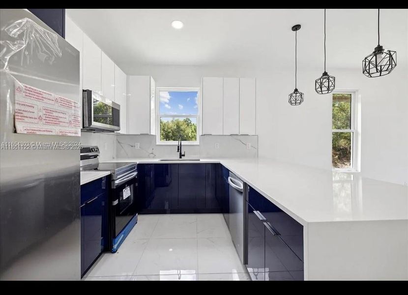 Furnished interior view inside a new home in , Lehigh Acres (Image 2). Furnished interior view inside a new home in , Lehigh Acres (Image 2).