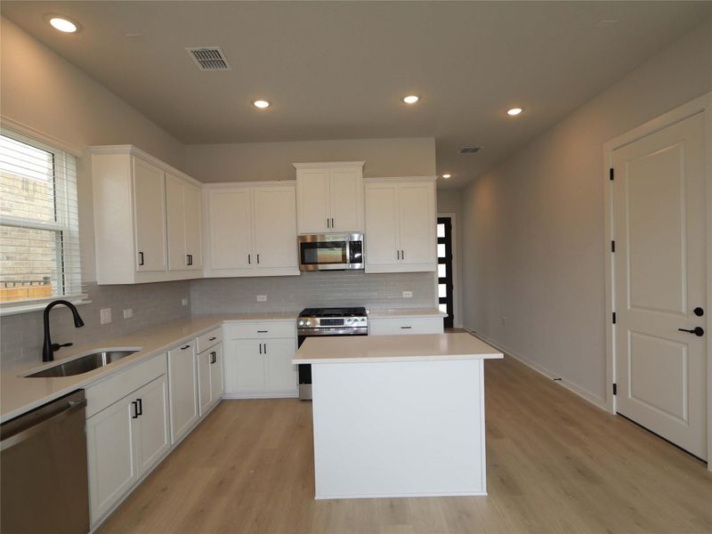 Furnished interior view inside a new home in Estancia West, Manchaca (Image 12).