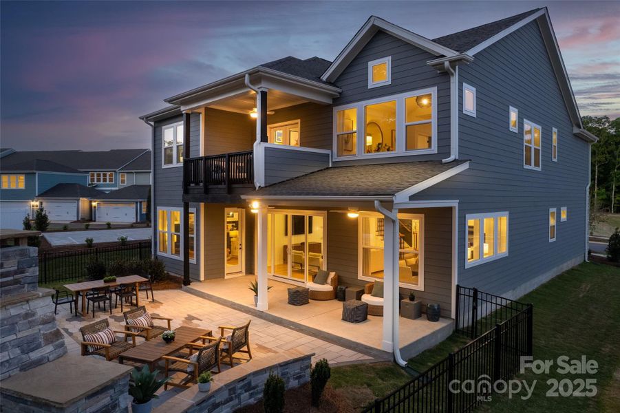 Exterior details and patio area of a home in North Creek Village, Huntersville (Image 23).