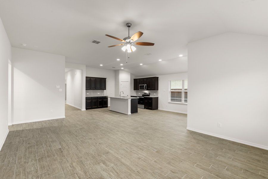 Representative exterior photo of a completed home built from the Cheyenne by Impression Homes in DeBerry Reserve, Royse City, TX (Image 12).