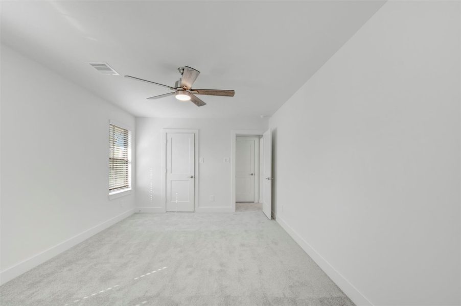 Spacious, unfurnished interior of a new home in The Oaks on 6th Street, Magnolia (Image 25).