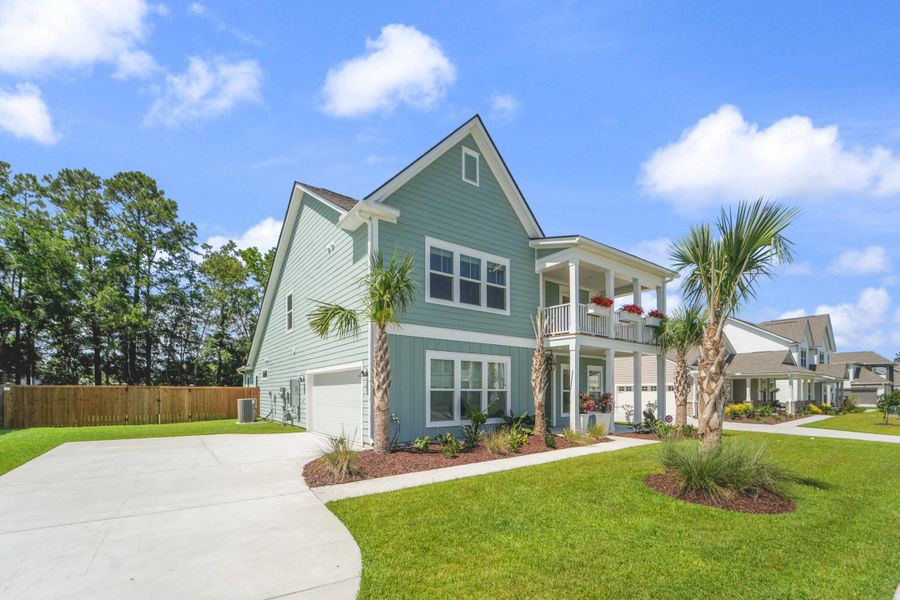Front exterior of a new home in , Johns Island, SC, highlighting curb appeal (Image 2). Front exterior of a new home in , Johns Island, SC, highlighting curb appeal (Image 2).