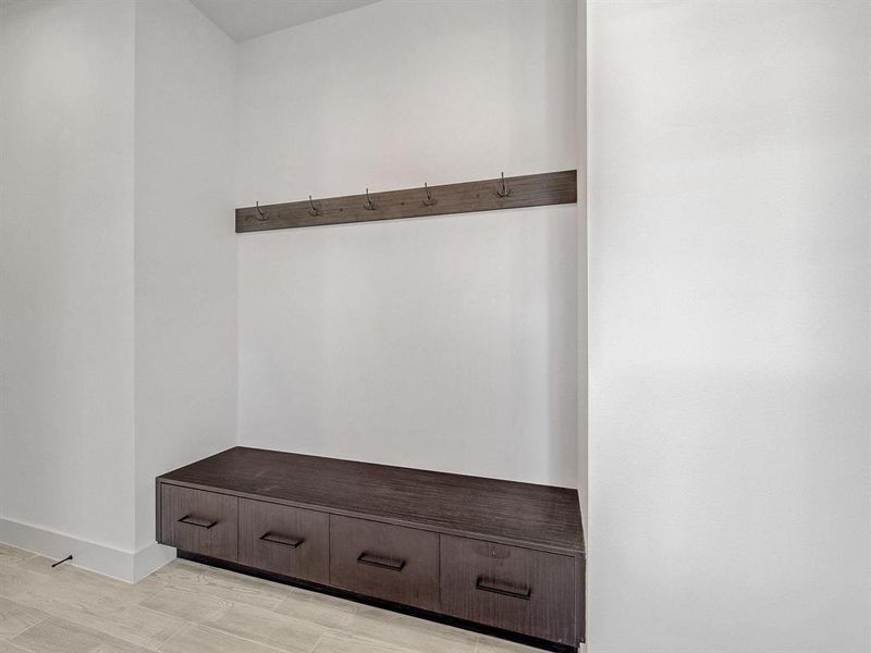 Mudroom featuring baseboards
