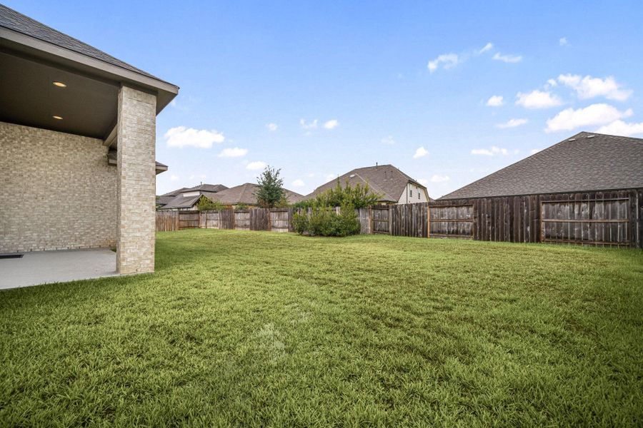 Whether you want space for your animals to run or enough room for a pool or a playground, this backyard has endless possibilities.