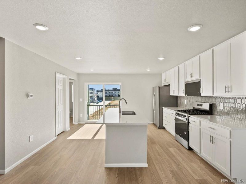 Furnished interior view inside a new home in Three Hills, Morrison (Image 13).