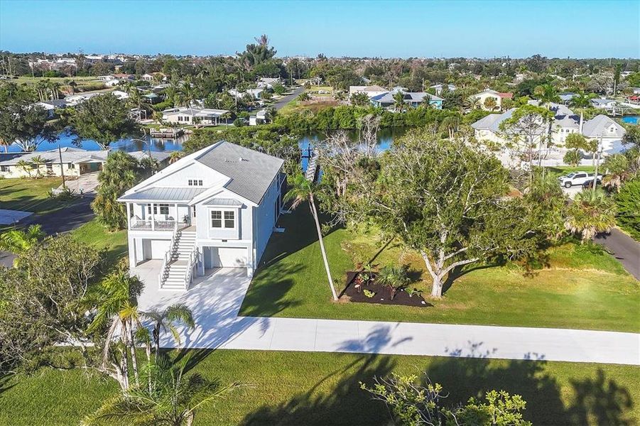Front exterior of a new home in , Englewood, FL, highlighting curb appeal (Image 2).