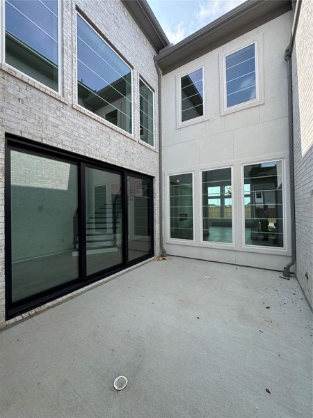 Exterior details and patio area of a home in Legacy Prairie at Katy Court 60', Katy (Image 14).