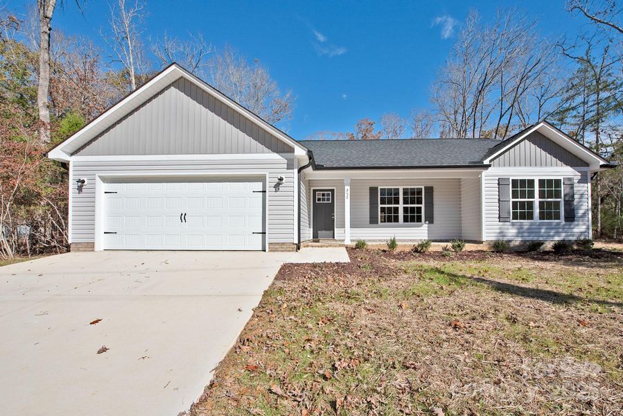 Front exterior of a new home in , Mount Gilead, NC, highlighting curb appeal (Image 19).