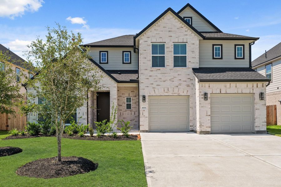 Front exterior of a new home in Briarwood Crossing, Rosenberg, TX, highlighting curb appeal (Image 16).