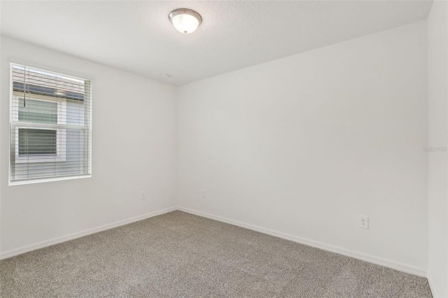 Spacious, unfurnished interior of a new home in Eden Hills, Lake Alfred (Image 27).