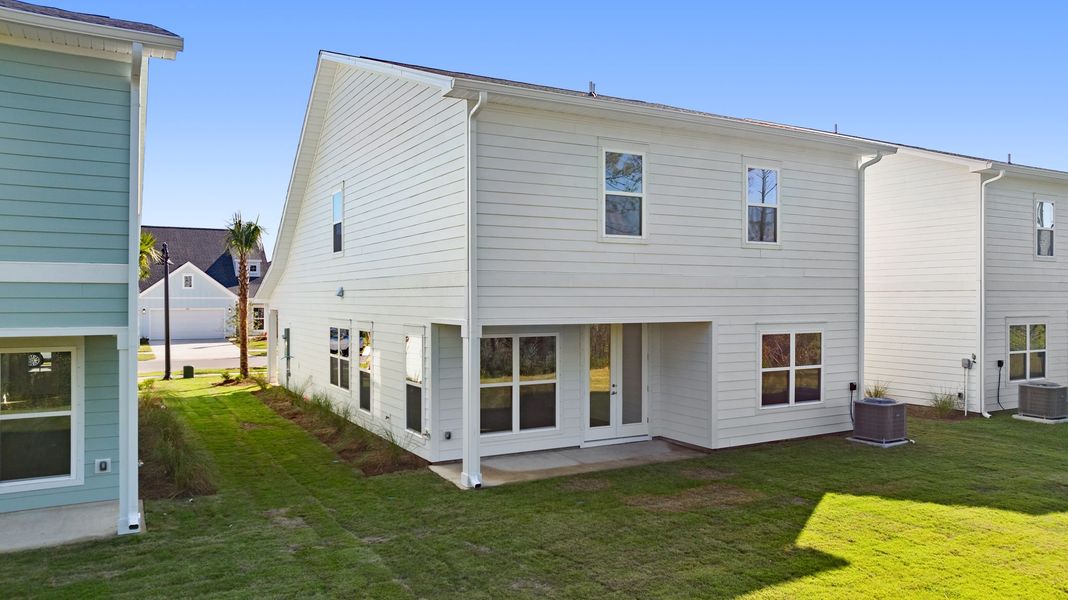 Exterior details and patio area of a home in Breakfast Point East Phase I, Panama City Beach (Image 3).
