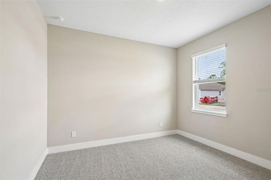 Spacious, unfurnished interior of a new home in Legends Preserve - Signature Series, Daytona Beach (Image 32).