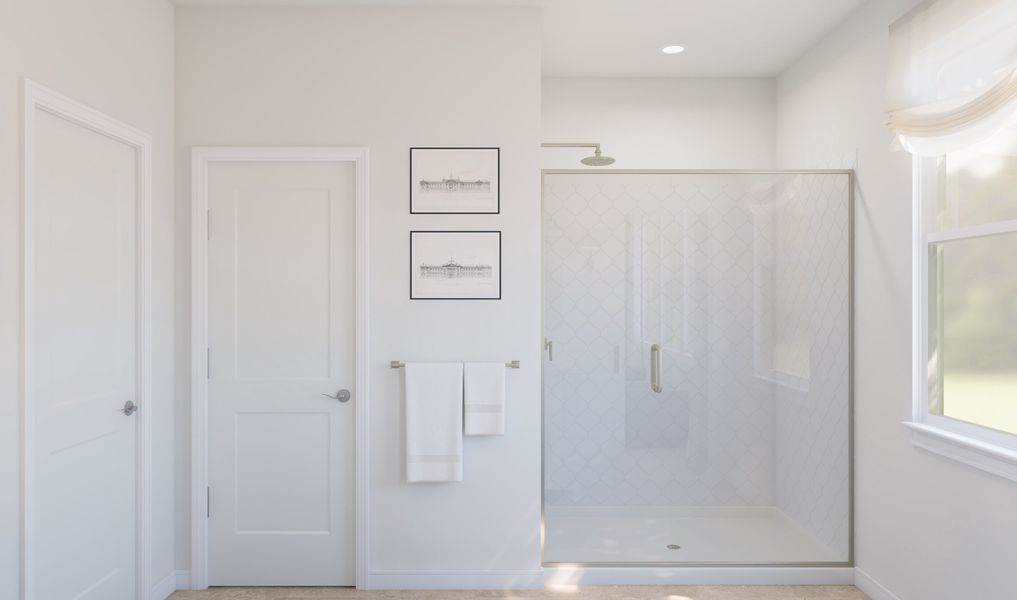 Primary bath with glass shower enclosure