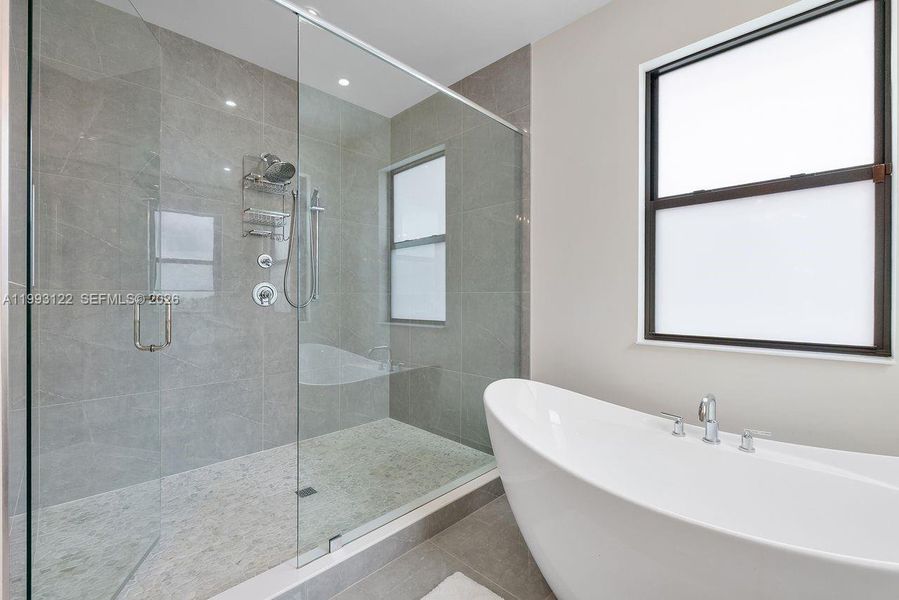 Furnished interior view inside a new home in Solana Bay at Avenir, Palm Beach Gardens (Image 32).