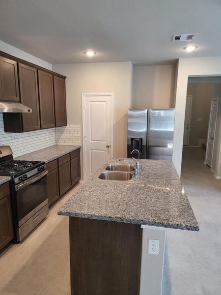 Another view of the kitchen