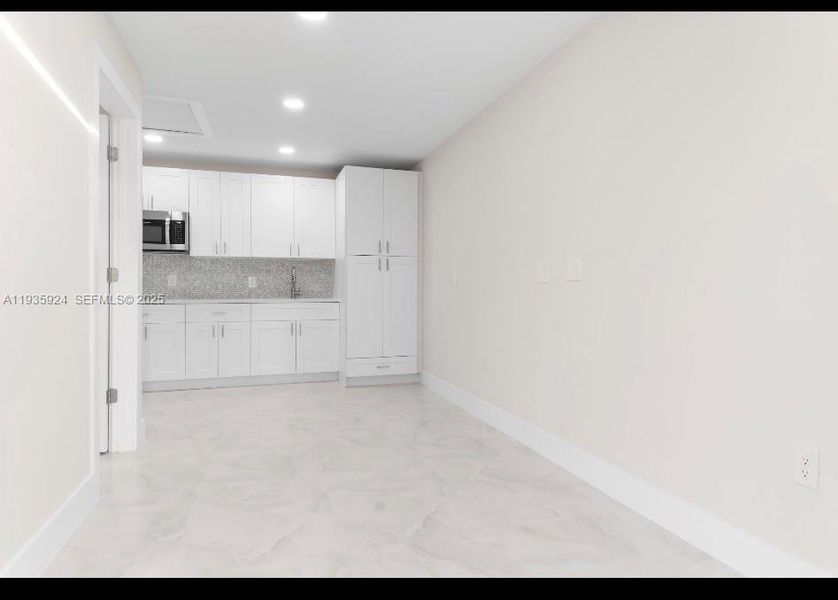 LIVING ROOM/ KITCHEN WITH WASHER AND DRYER