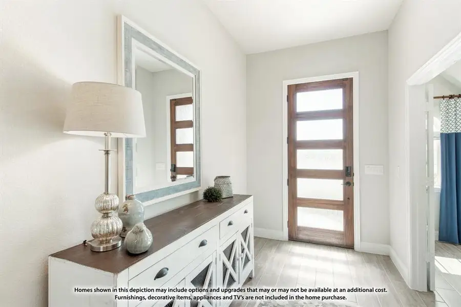 Furnished interior view inside a new home in ArrowBrooke, Aubrey (Image 9).