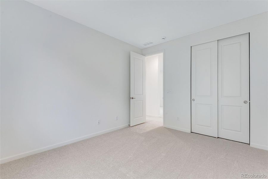 Spacious, unfurnished interior of a new home in Reunion, Commerce City (Image 39).