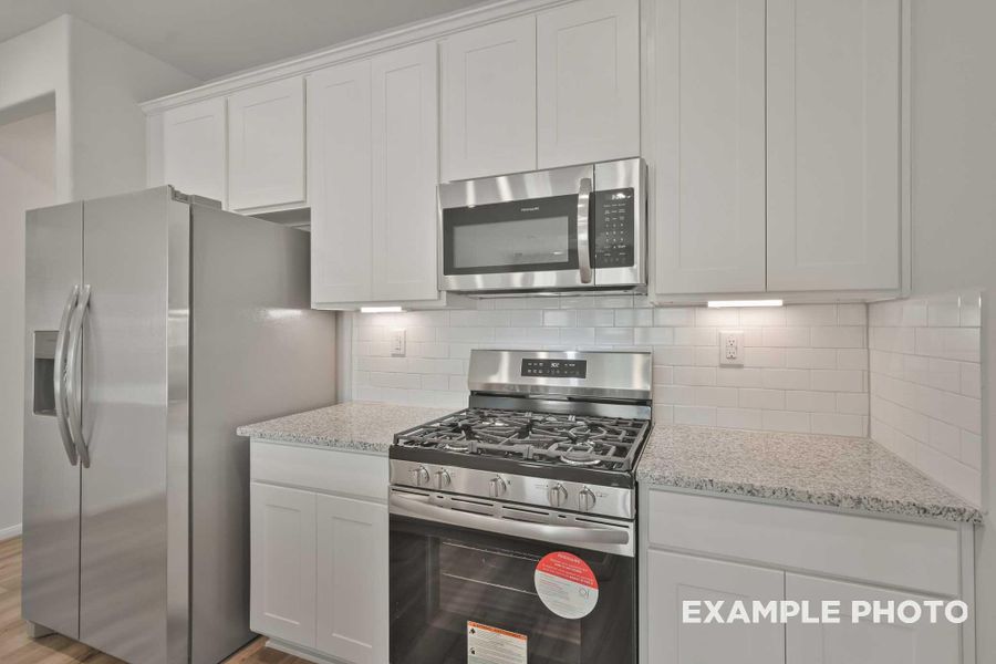 Furnished interior view inside a new home in Spring Branch Crossing, Conroe (Image 6).