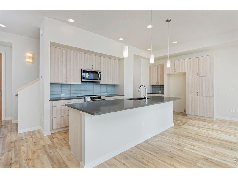 Furnished interior view inside a new home in West Grange, Longmont (Image 6).