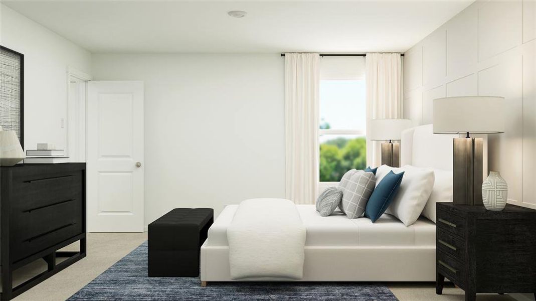 Bedroom with light colored carpet