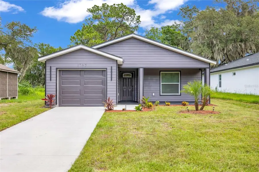 Front exterior of a new home in , Sanford, FL, highlighting curb appeal (Image 27). Front exterior of a new home in , Sanford, FL, highlighting curb appeal (Image 27).