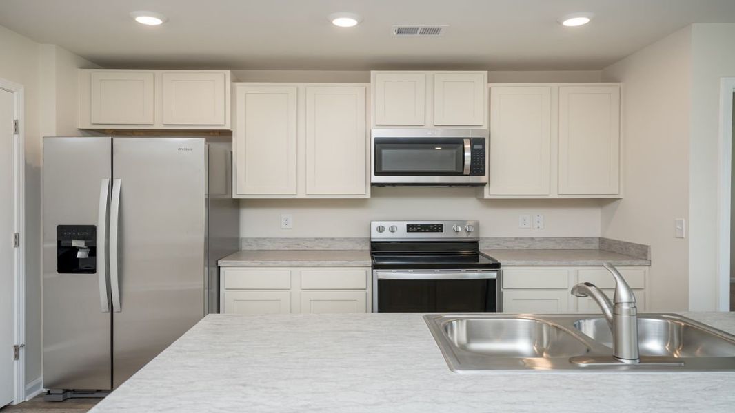 Representative furnished interior of a home built from the ARIA by D.R. Horton in Jordanville Farms, Galivants Ferry (Image 10).