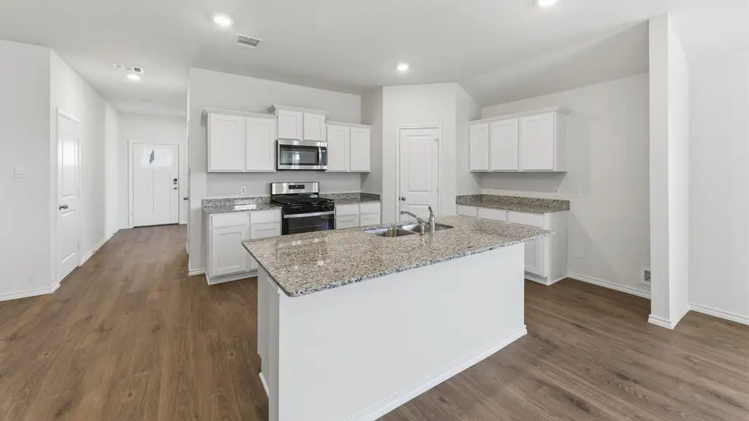 Furnished interior view inside a new home in Windrose, Pilot Point (Image 3).