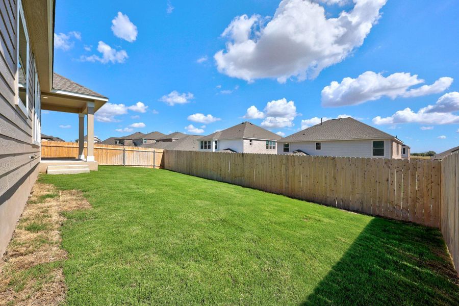Exterior details and patio area of a home in Salerno - Classic Collection, Round Rock (Image 3).